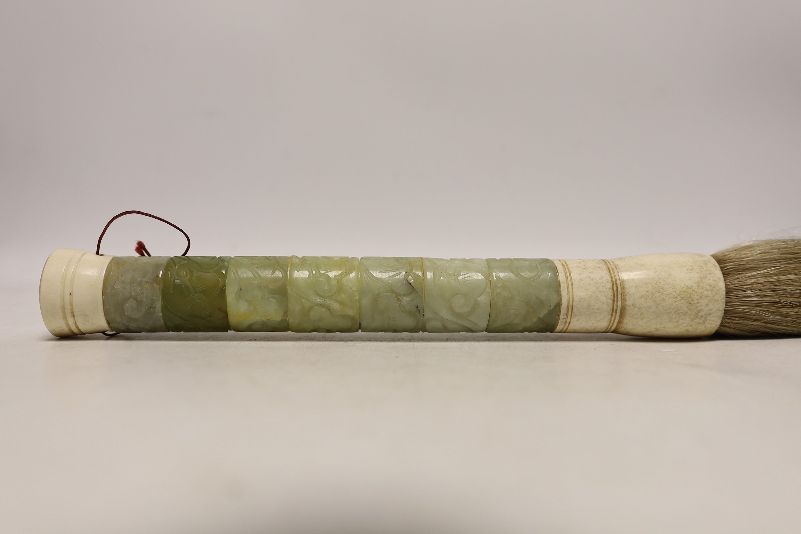 A mixed carved jadeite fly whisk, 39cm long